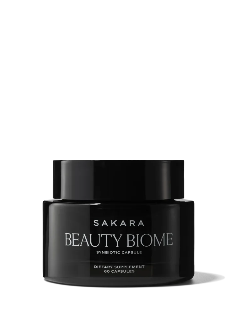Sakara Beauty Biome synbiotic capsules in glossy black jar with white label and black lid, 60 capsules dietary supplement, with green Best Seller badge